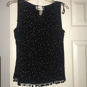 Black polka dot tank top.